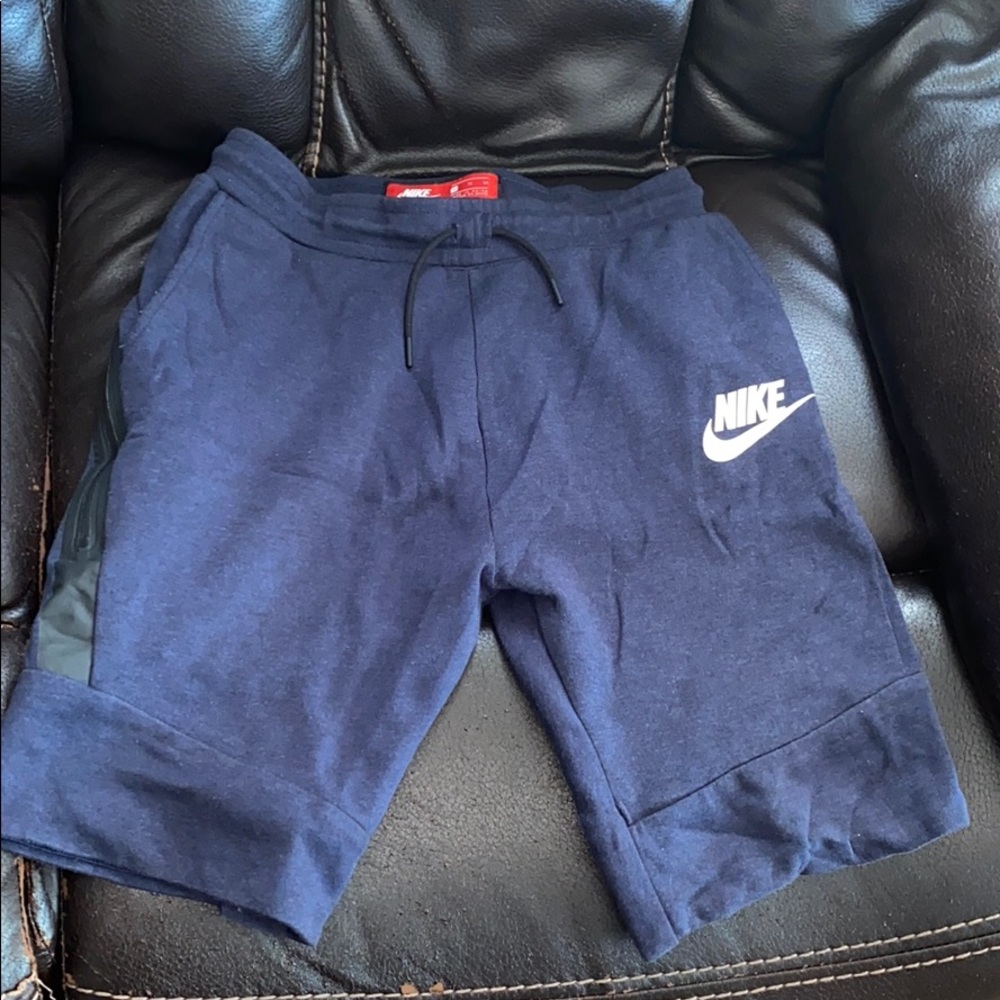blue nike tech shorts